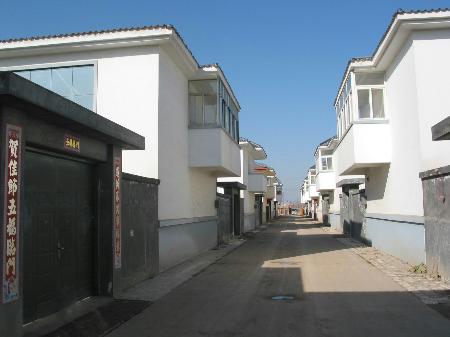 Coffey Architects在廢棄的工業(yè)洗衣場(chǎng)上建造磚砌的退休住宅