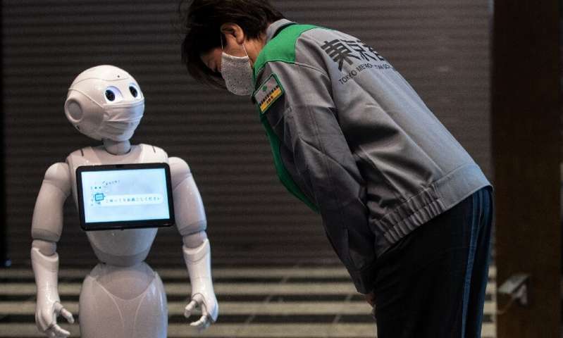 “我為你加油”：在東京檢疫區歡迎機器人