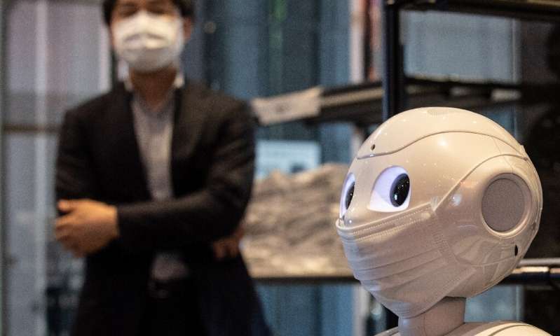 “我為你加油”：在東京檢疫區歡迎機器人